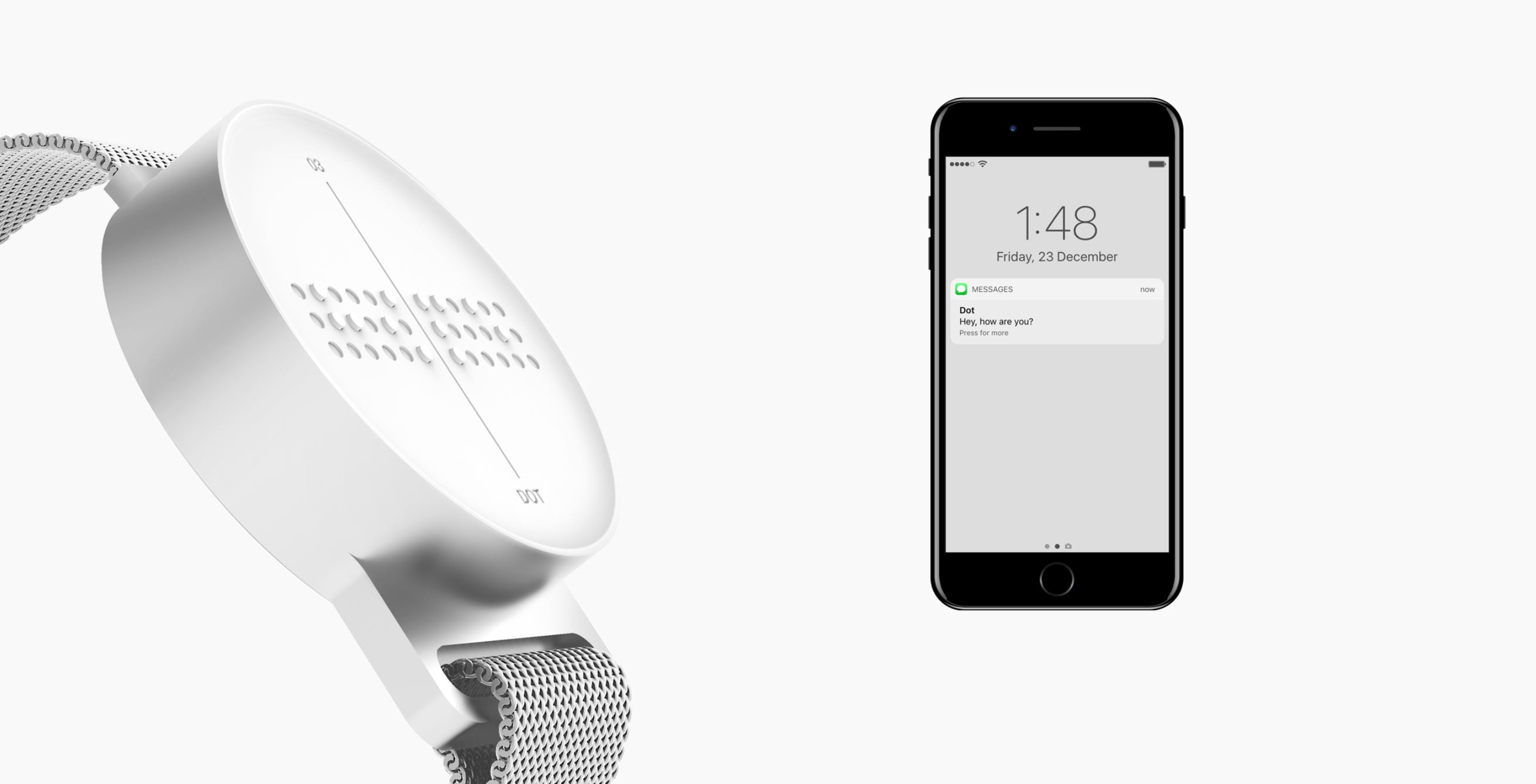 Bild 2: Eine Smartwatch mit erhobener 3-D Brailleschrift ist zu sehen. Daneben eine Smartphone.
